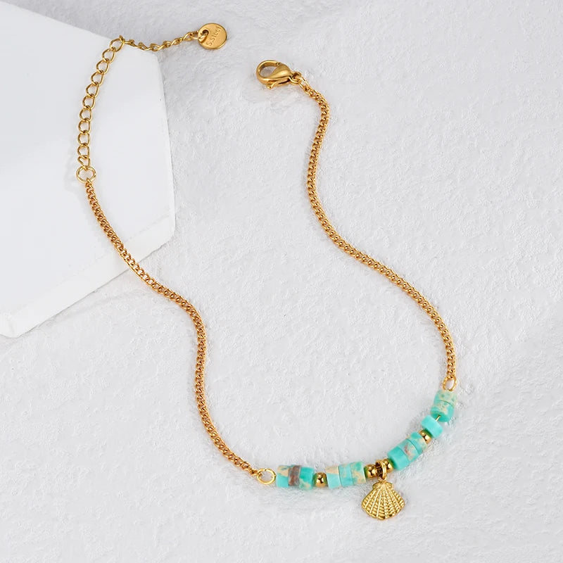 Bracelet coquillage acier doré femme