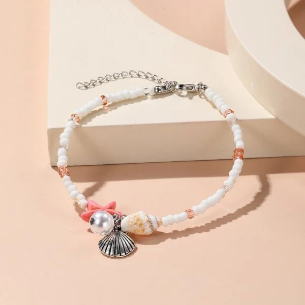 Bracelet coquillage étoile femme