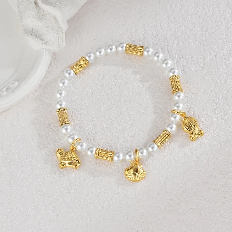 Bracelet coquillage acier doré femme