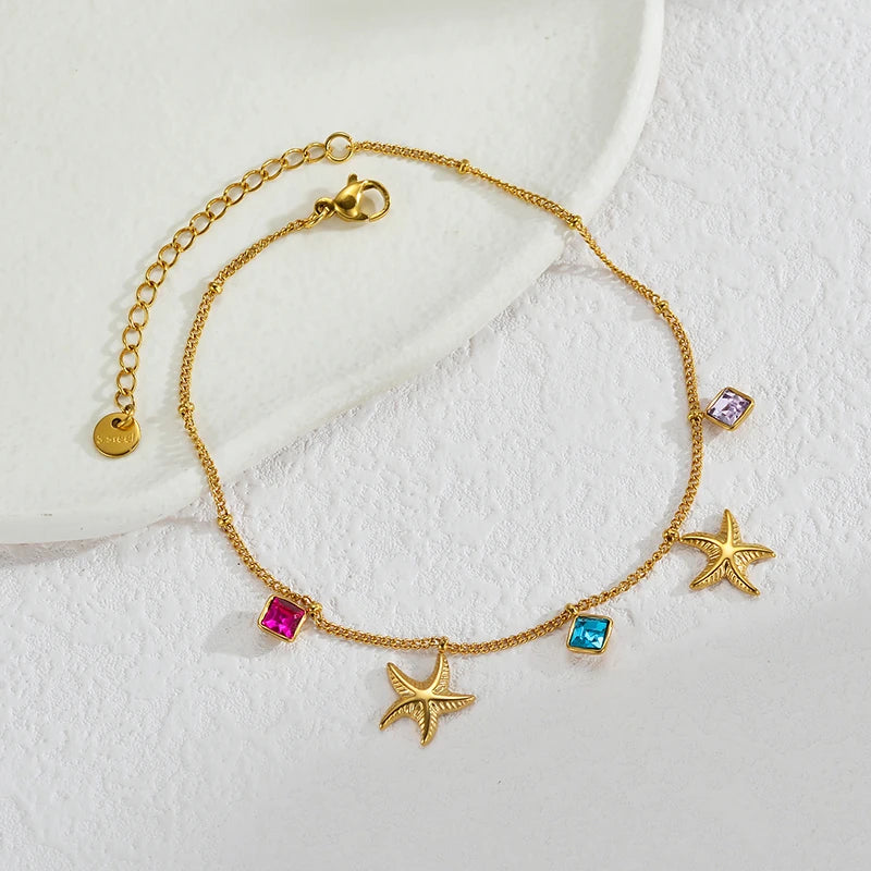 Bracelet coquillage acier doré femme