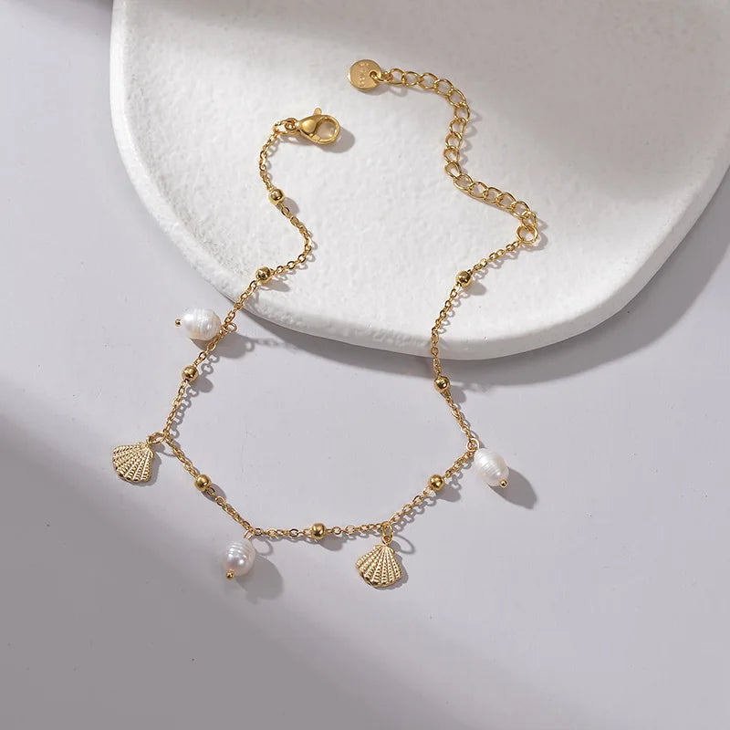 Bracelet coquillage acier doré femme